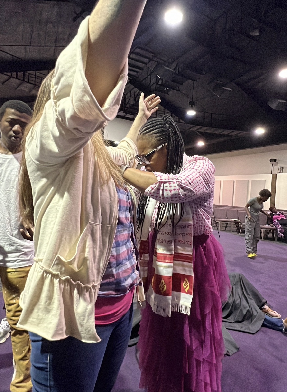 Hands raised in prayer and impartation